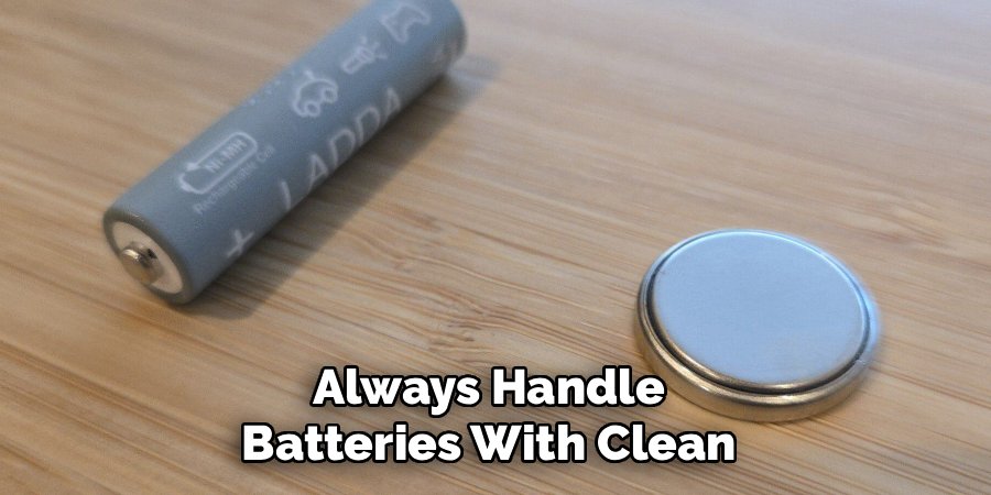 Always Handle
Batteries With Clean