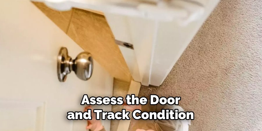 Assess the Door and Track Condition