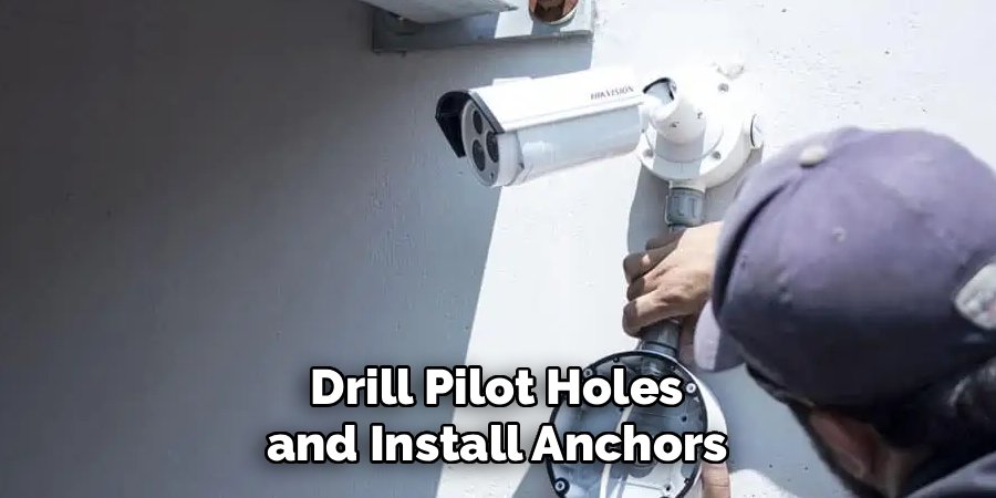 Drill Pilot Holes and Install Anchors
