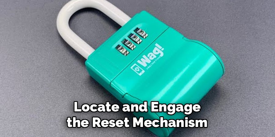 Locate and Engage the Reset Mechanism