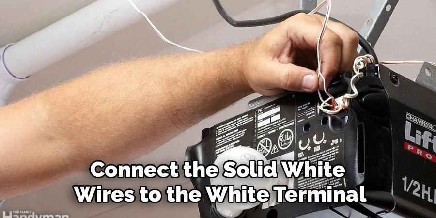 Connect the Solid White
Wires to the White Terminal