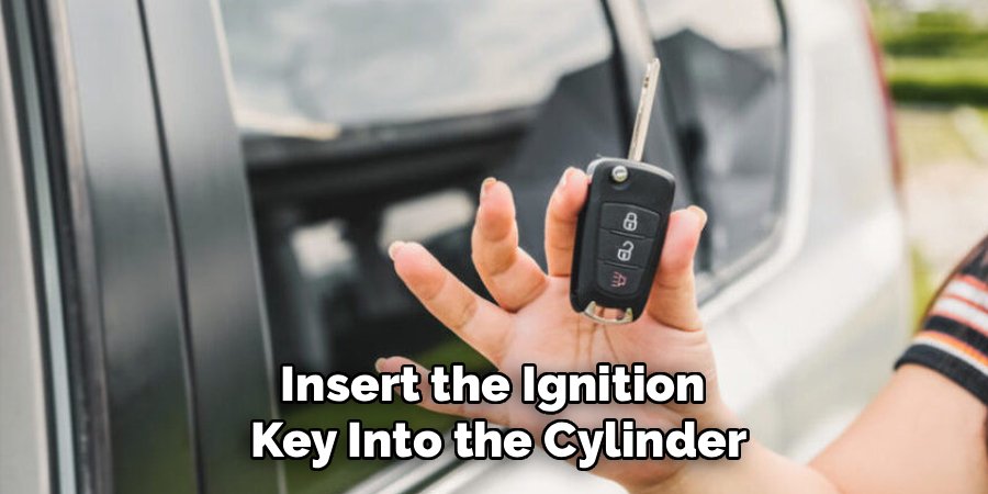 Insert the Ignition
Key Into the Cylinder