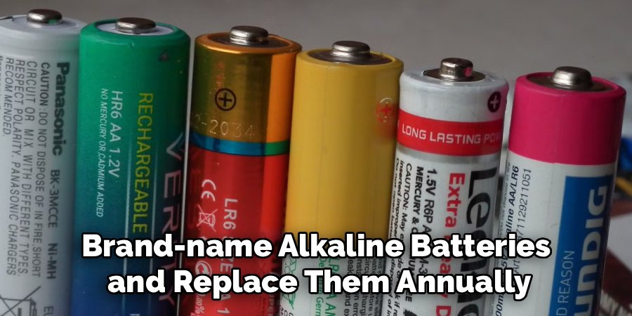 Brand-name Alkaline Batteries
and Replace Them Annually