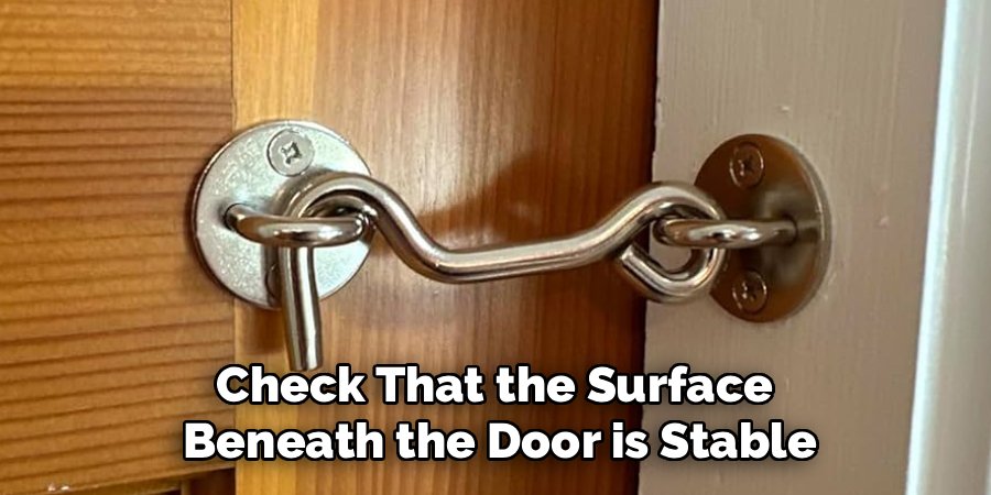 Check That the Surface 
Beneath the Door is Stable