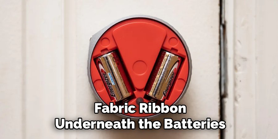 Fabric Ribbon Underneath the Batteries