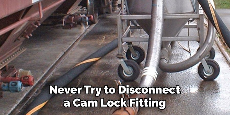 Never Try to Disconnect a Cam Lock Fitting