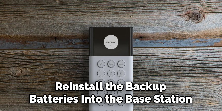 Reinstall the Backup
Batteries Into the Base Station