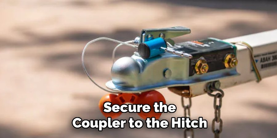 Secure the Coupler to the Hitch