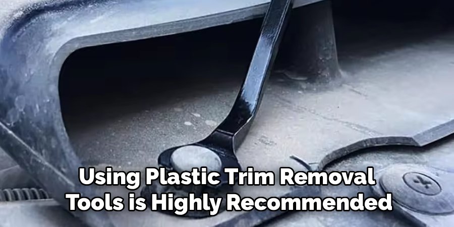 Using Plastic Trim Removal
Tools is Highly Recommended