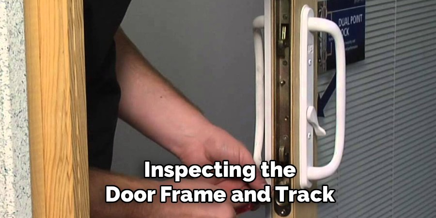Inspecting the Door Frame and Track