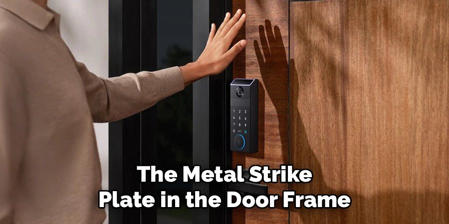 The Metal Strike Plate in the Door Frame